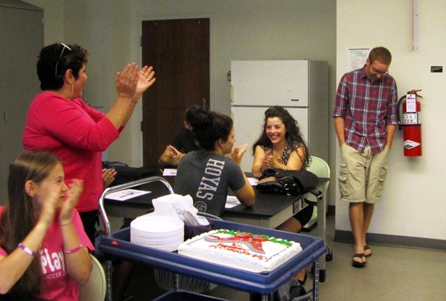 CLSE staff barge into Jeff's class to present the award.