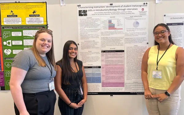 Carissa Kohlwey, Simran Dhillon and Jerzie Johnson with their poster at SABER East conference